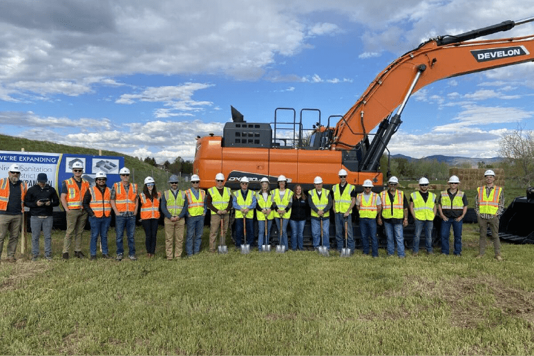 Group photo of engineers, construction workers, and Direct Discharge consultants at the Niwot Sanitation District plant breaking ground ceremony.